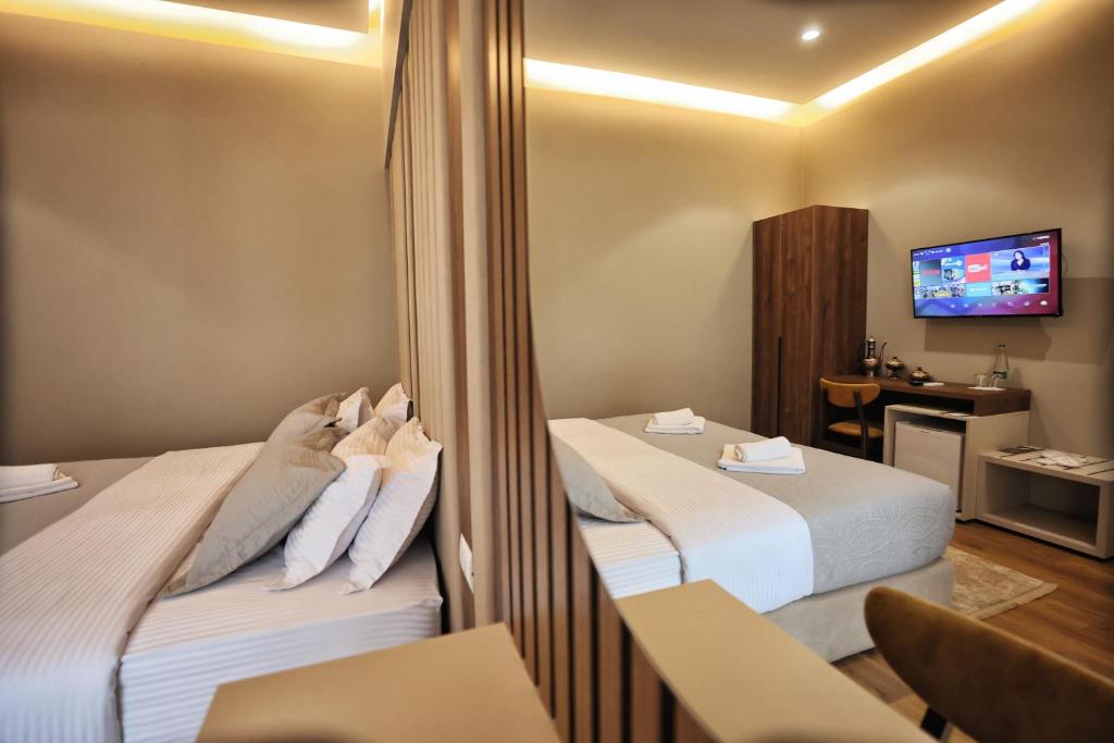 TV a/nebo společenská místnost v ubytování Vila Casablanca - Boutique Hotel & Restaurant