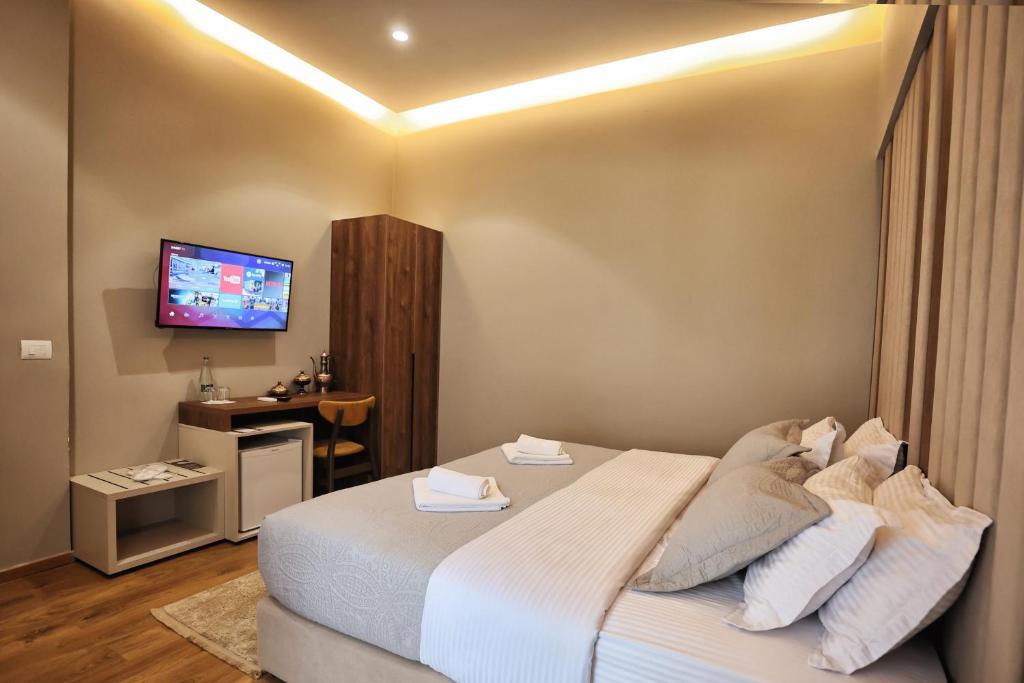 Postel nebo postele na pokoji v ubytování Vila Casablanca - Boutique Hotel & Restaurant