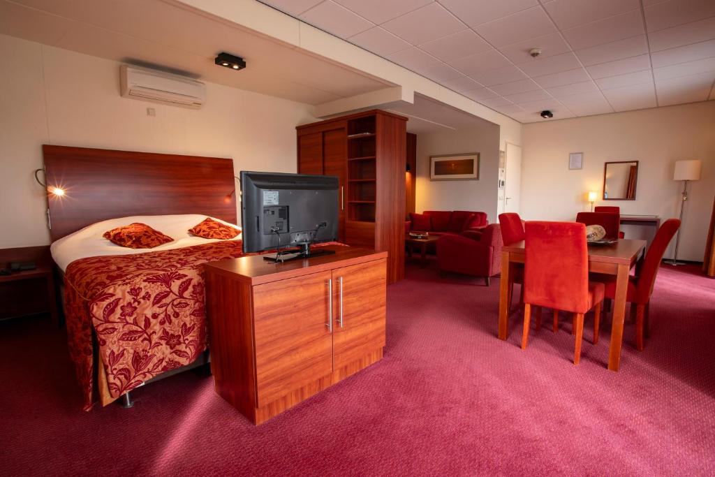 TV a/nebo společenská místnost v ubytování Hotel Greenside Texel