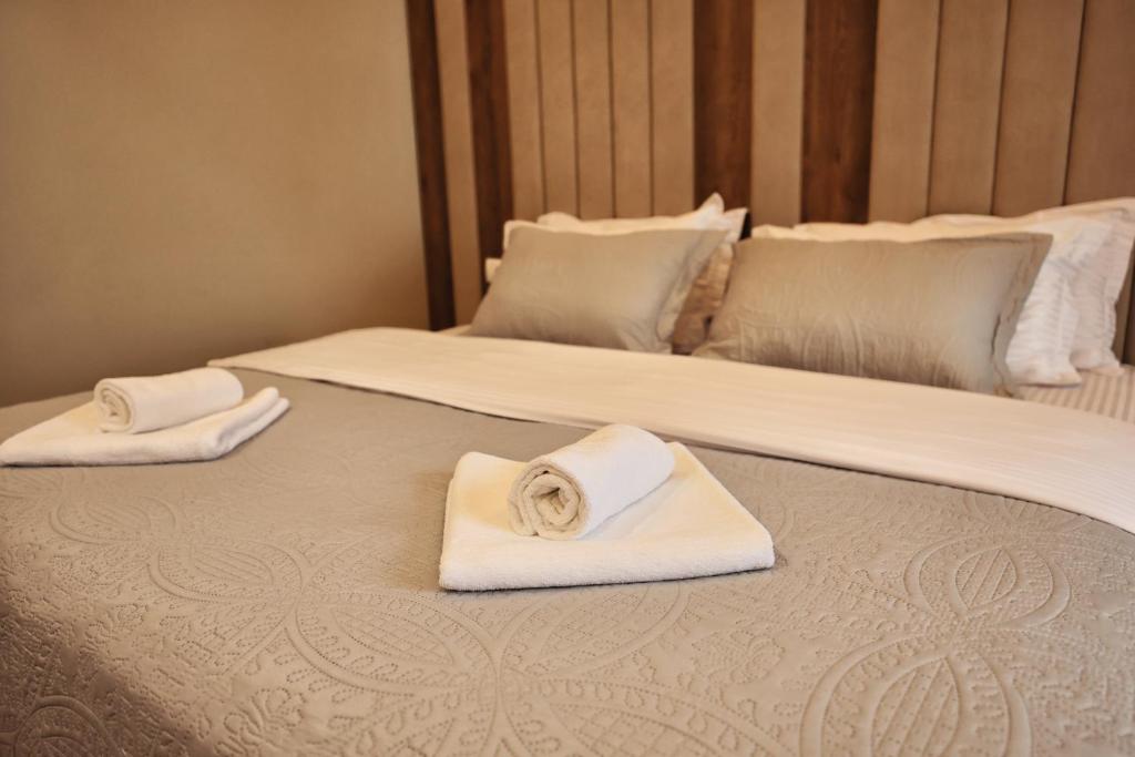 Postel nebo postele na pokoji v ubytování Vila Casablanca - Boutique Hotel & Restaurant