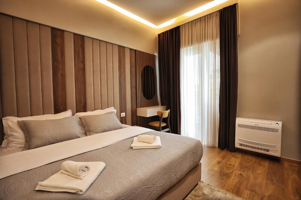 Postel nebo postele na pokoji v ubytování Vila Casablanca - Boutique Hotel & Restaurant