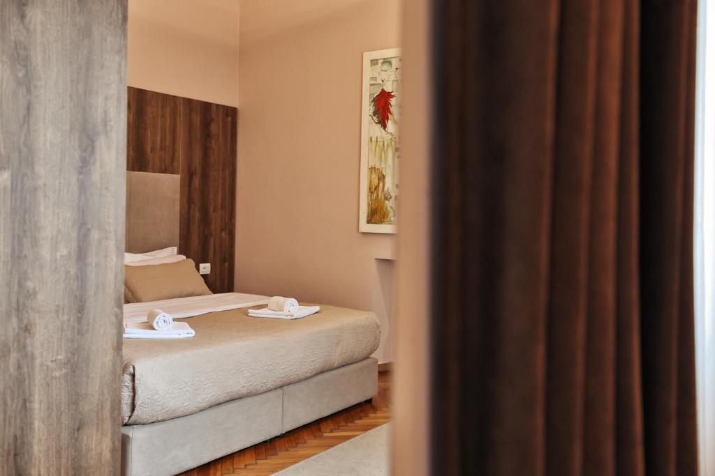 Postel nebo postele na pokoji v ubytování Vila Casablanca - Boutique Hotel & Restaurant