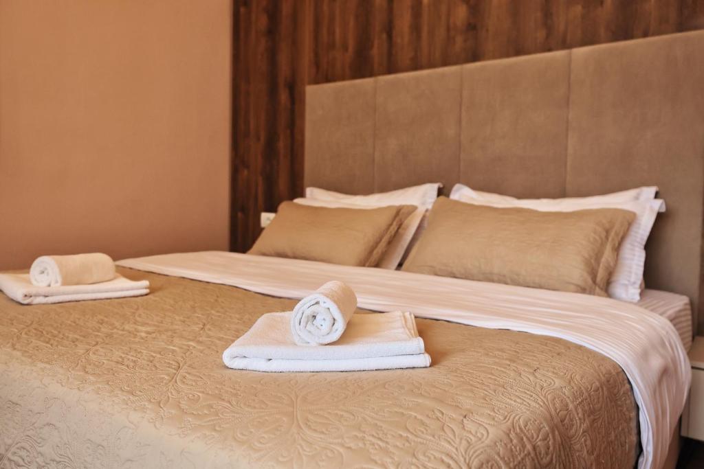 Postel nebo postele na pokoji v ubytování Vila Casablanca - Boutique Hotel & Restaurant