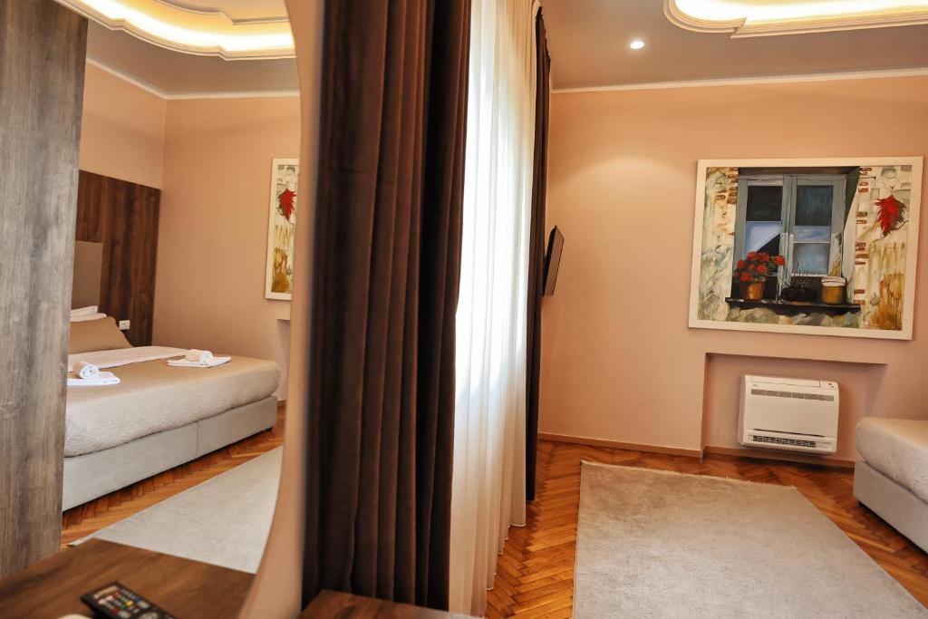 Postel nebo postele na pokoji v ubytování Vila Casablanca - Boutique Hotel & Restaurant