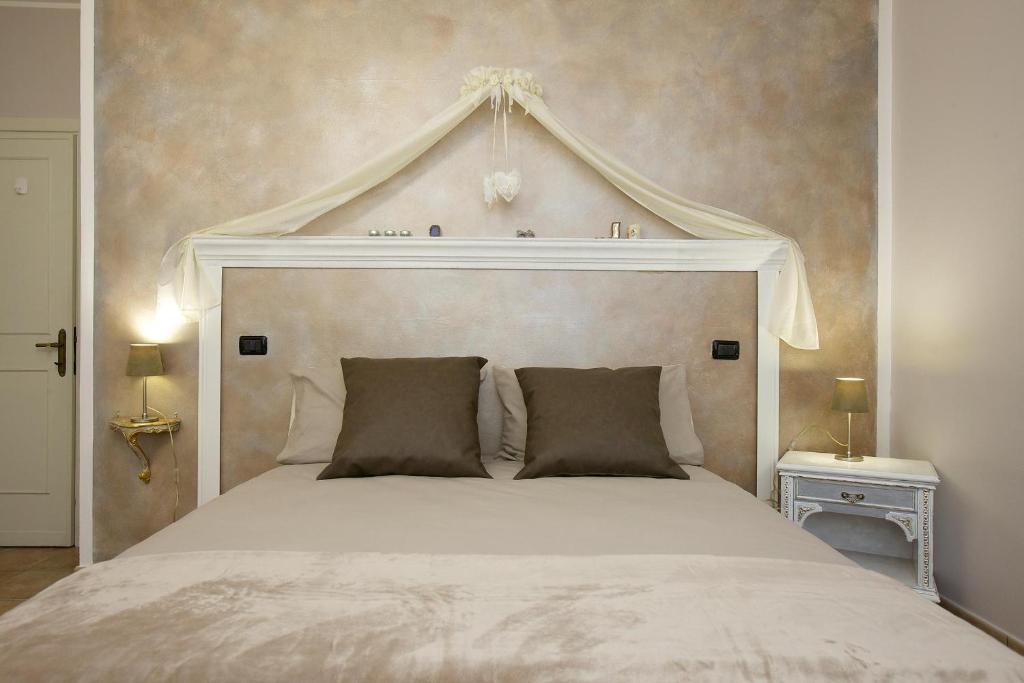 A bed or beds in a room at Torretta d'Assisi