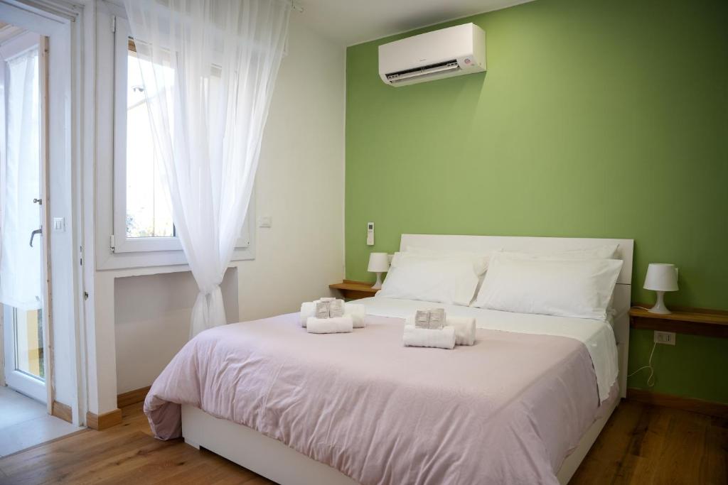 Postel nebo postele na pokoji v ubytování LHE Sole di Primavera