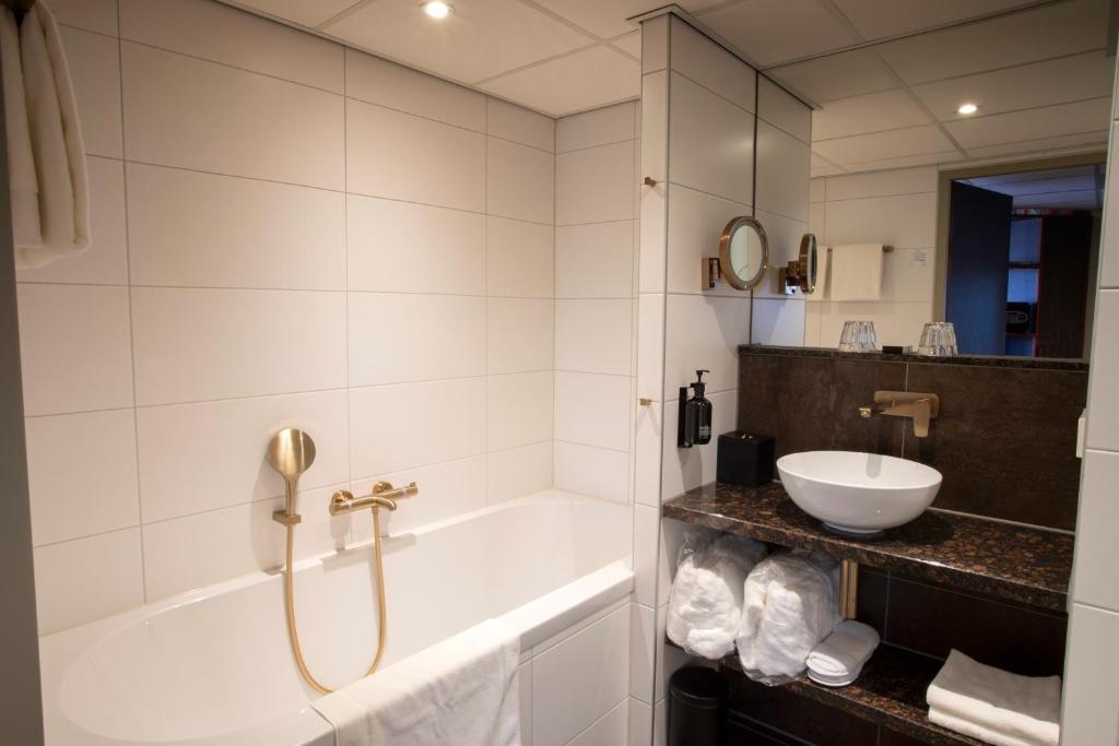 Koupelna v ubytování Hotel Greenside Texel