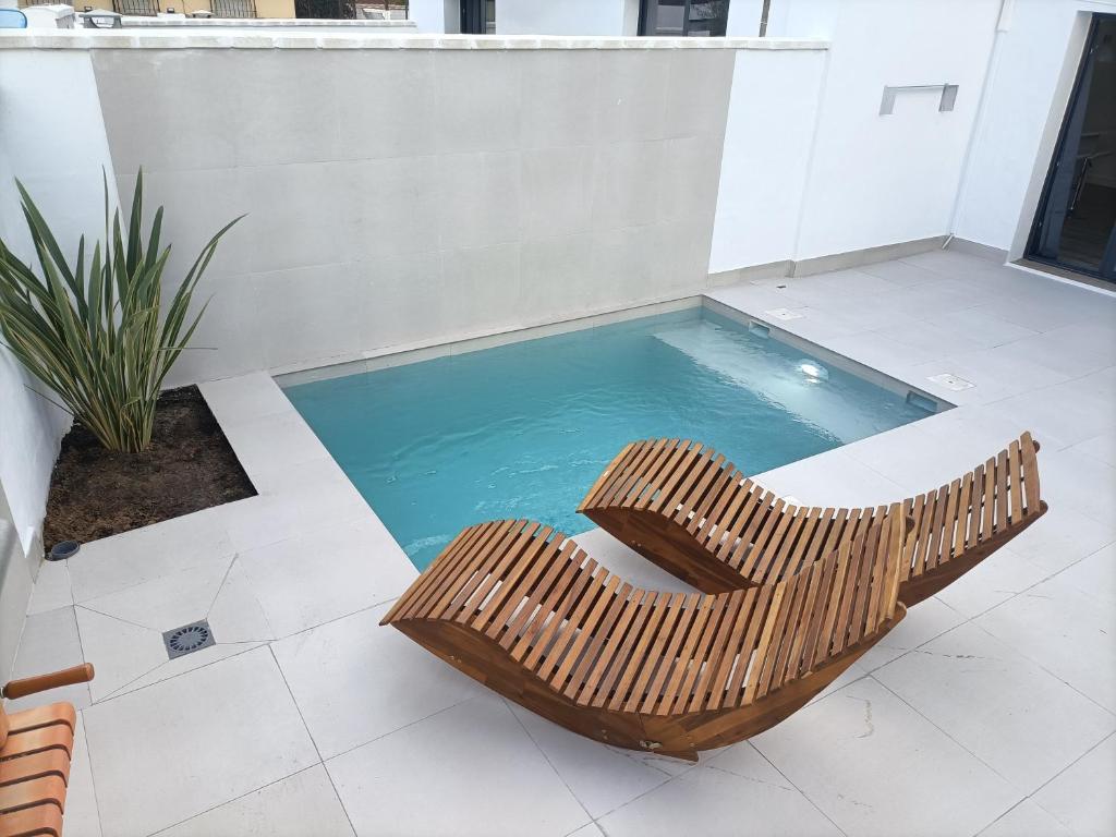 La alberca dentro o cerca de Villas Noah