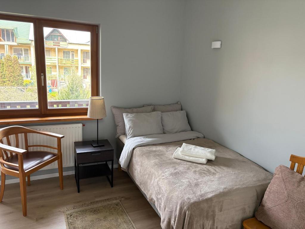 Postel nebo postele na pokoji v ubytování Domus Revado