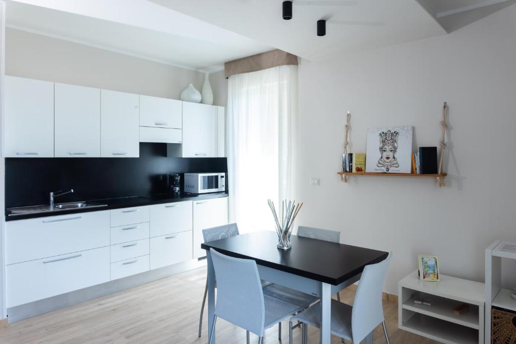 Kuchyň nebo kuchyňský kout v ubytování Villa Da Vinci Luxury Panoramic Apartments - Taormina rooms collection