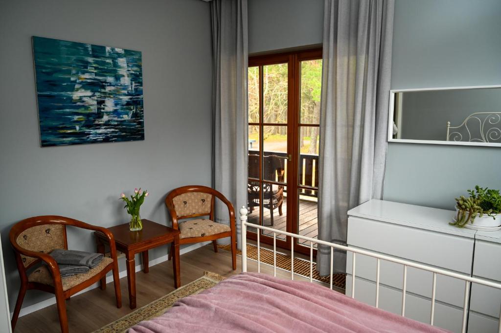 Postel nebo postele na pokoji v ubytování Domus Revado