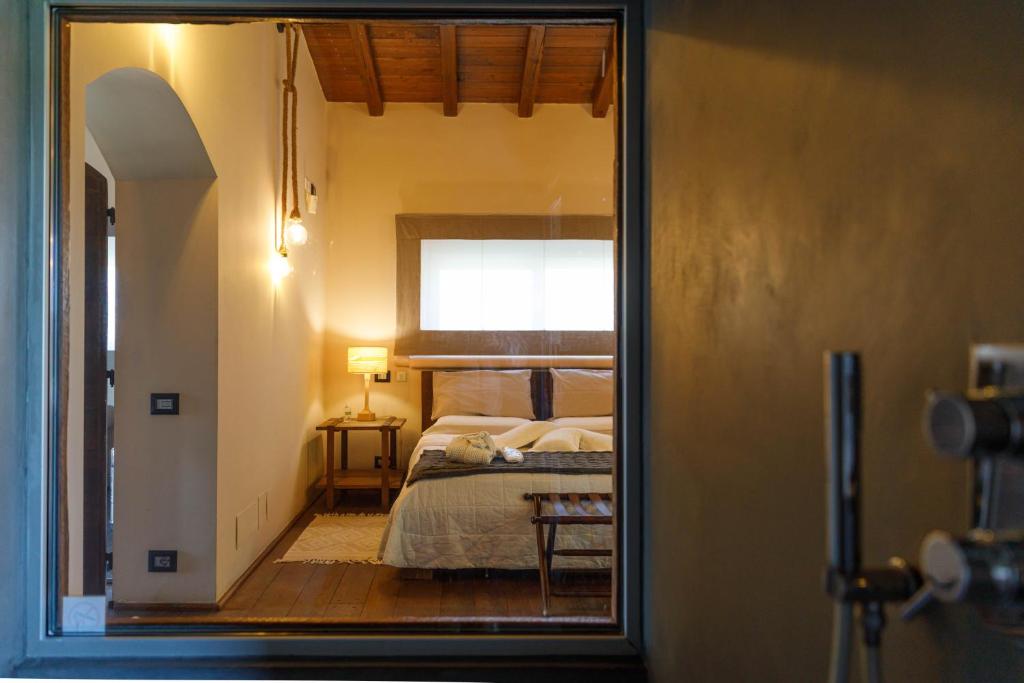 Postel nebo postele na pokoji v ubytování Villa & Spasuitebo Roma