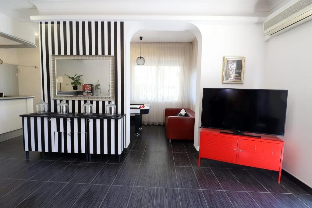 TV a/nebo společenská místnost v ubytování Fasthotel