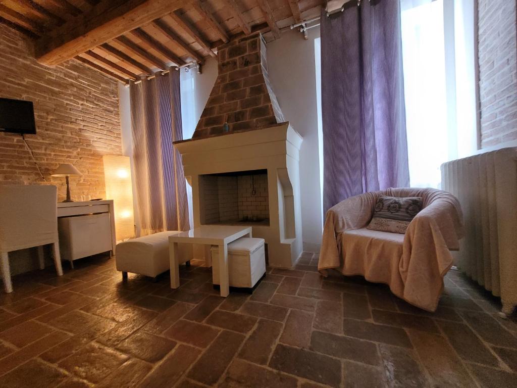 Postel nebo postele na pokoji v ubytování Relais Casetta56