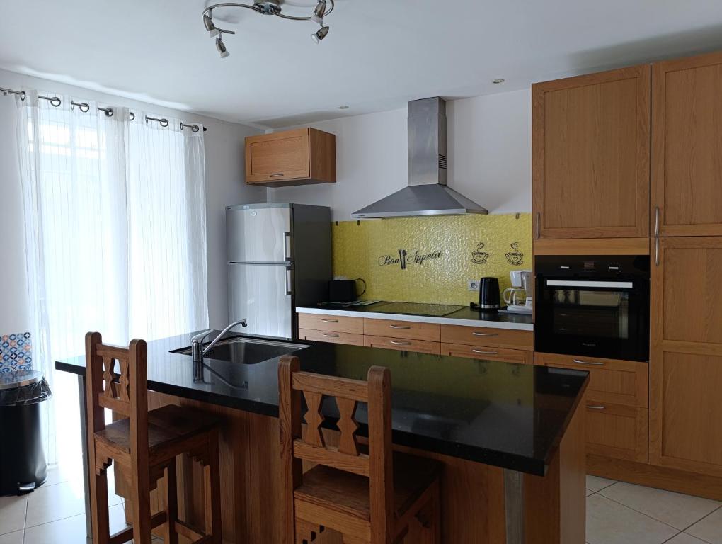 Kuchyňa alebo kuchynka v ubytovaní Maison spacieuse et agréable