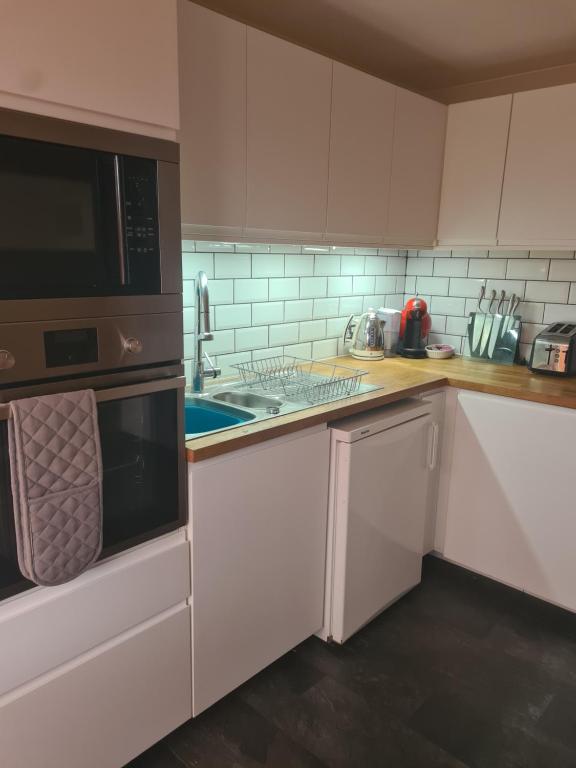 Kuchyň nebo kuchyňský kout v ubytování Fir Tree Lodge