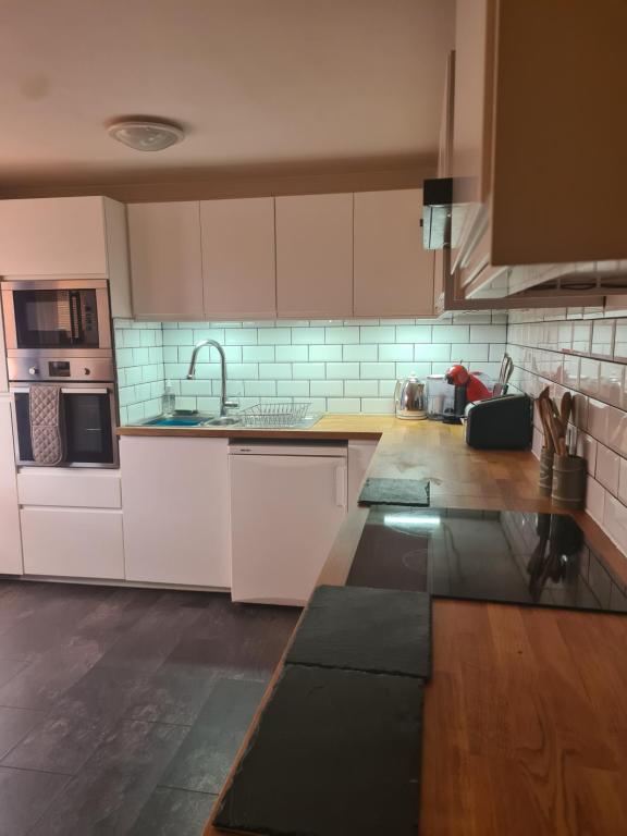 Kuchyň nebo kuchyňský kout v ubytování Fir Tree Lodge