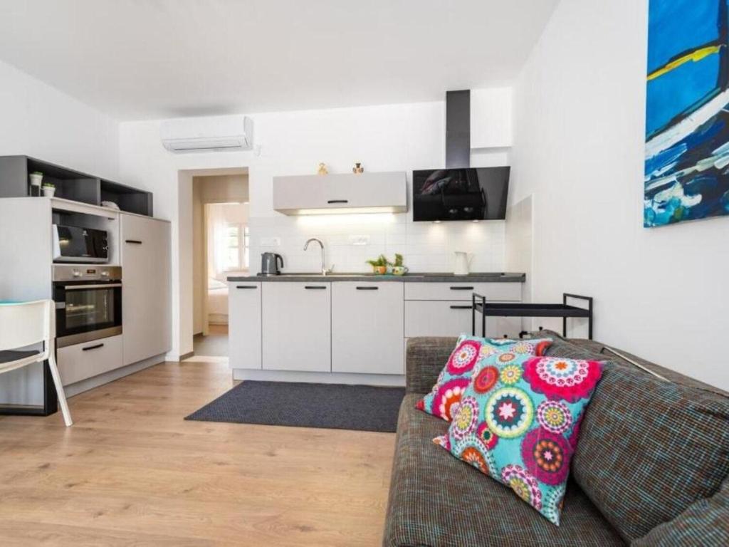 Kuchyň nebo kuchyňský kout v ubytování Apartments Bari