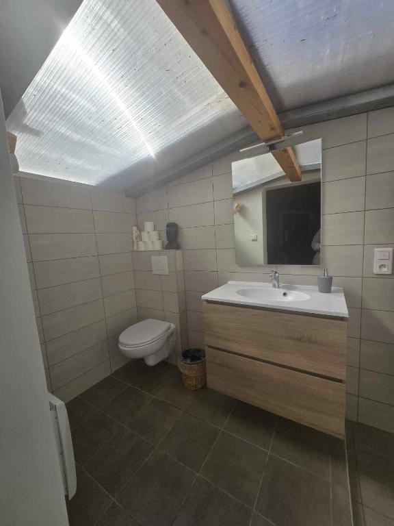 Koupelna v ubytování Chambre familiale "le pêcher"