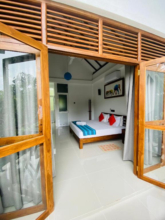 Postel nebo postele na pokoji v ubytování Hotel Athgira