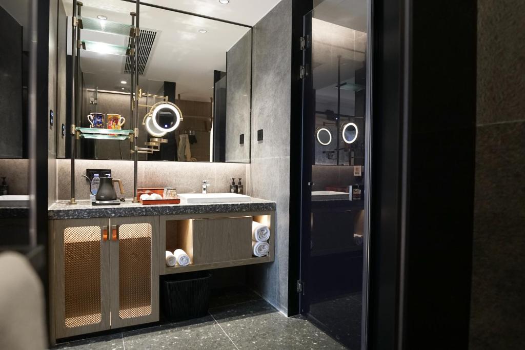 Koupelna v ubytování Paco Hotel Datang Metro Guangzhou