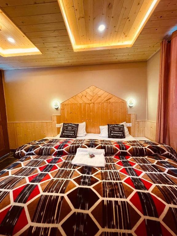 Postel nebo postele na pokoji v ubytování La Voglia-Old Manali
