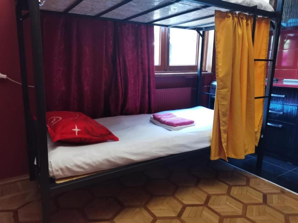 Postel nebo postele na pokoji v ubytování European Backpackers Hostel and 大廚房