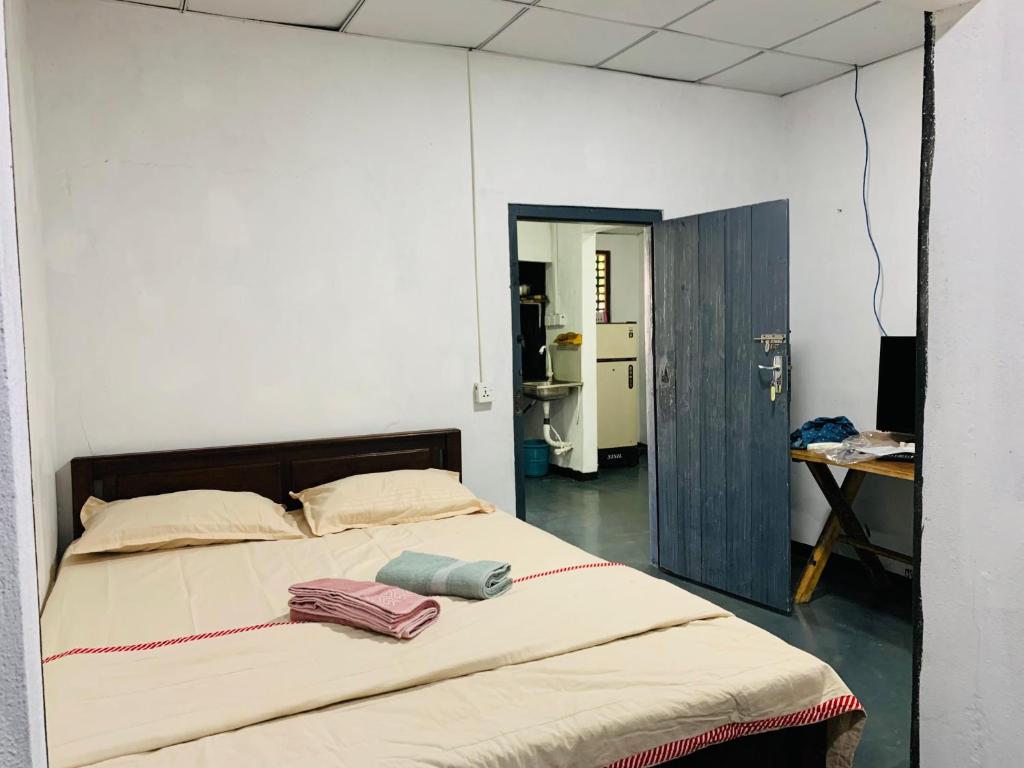 Postel nebo postele na pokoji v ubytování Hotel Surfing