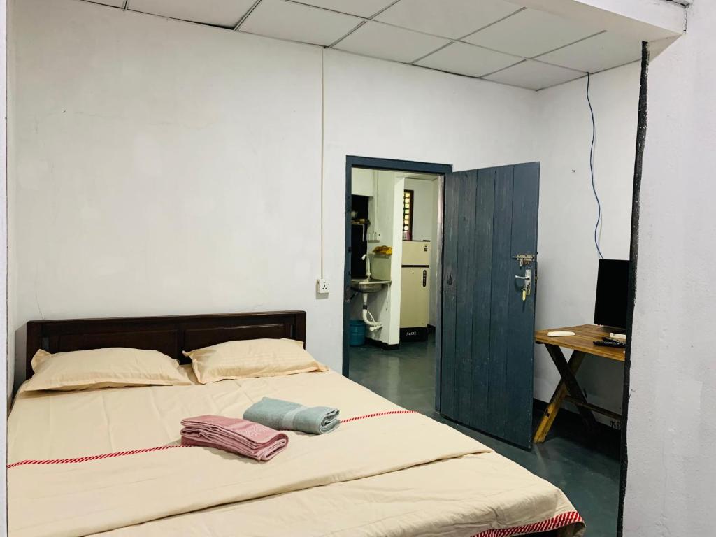 Postel nebo postele na pokoji v ubytování Hotel Surfing