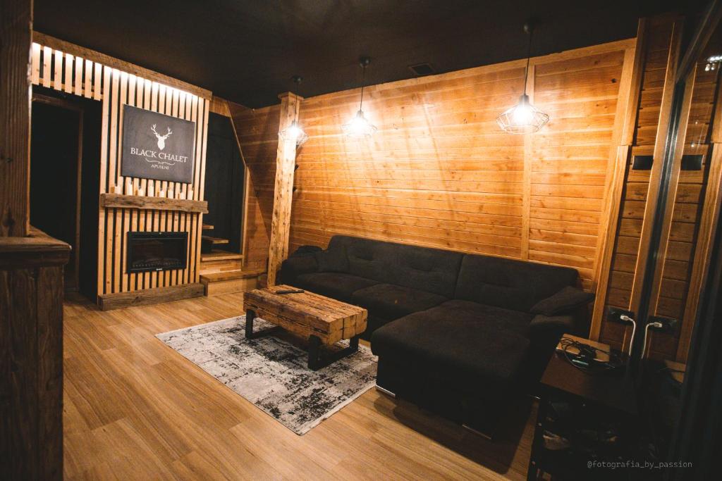 Posezení v ubytování Black Chalet