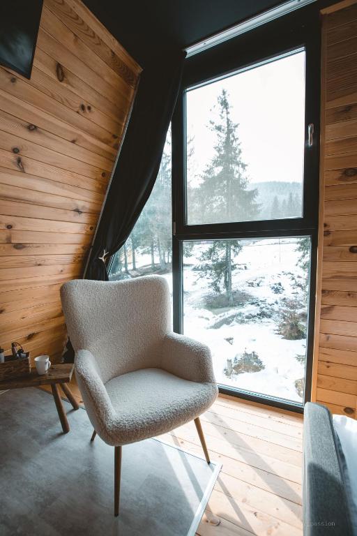Posezení v ubytování Black Chalet