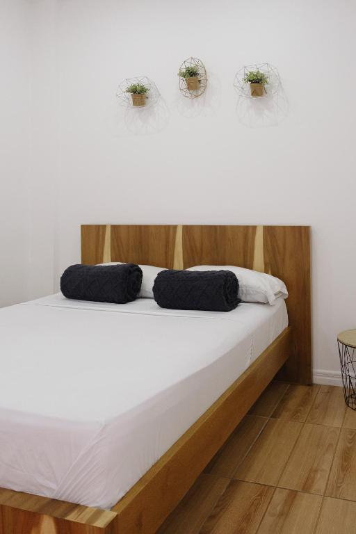 Voodi või voodid majutusasutuse Three House Hostel Boutique toas