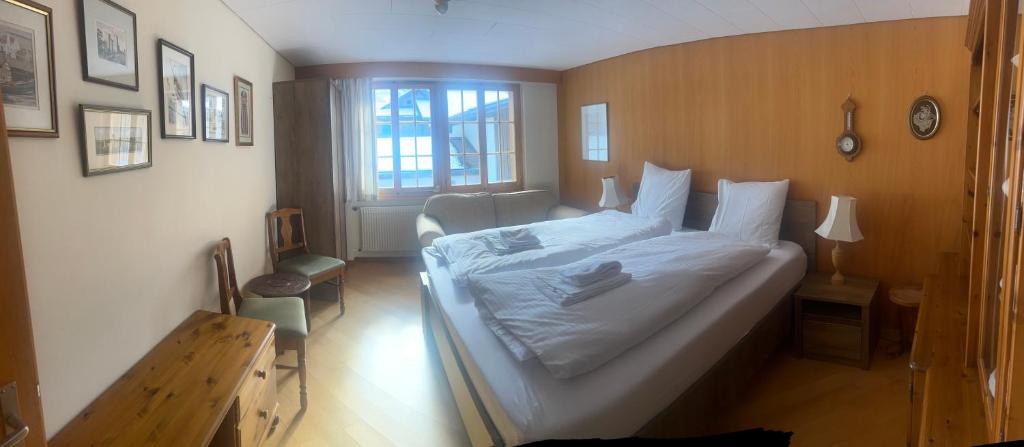 Postel nebo postele na pokoji v ubytování Chalet Bärli