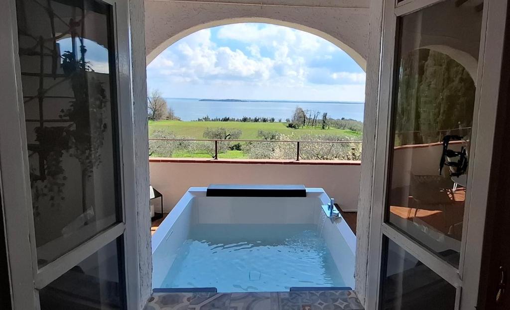 Fotografie z fotogalerie ubytování La Kascina Suite & Rooms v destinaci Moniga