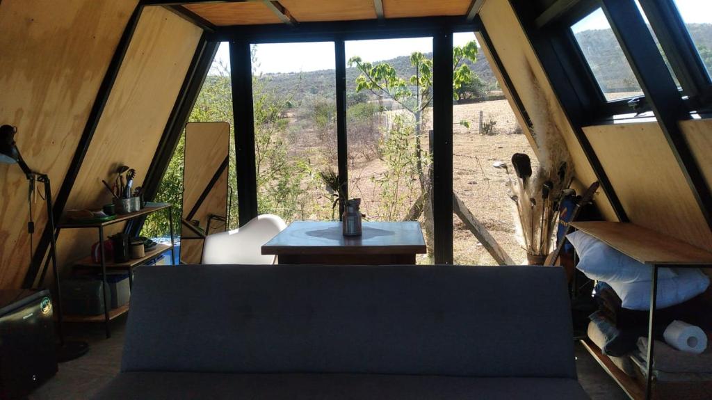 Posezení v ubytování Glamping en Cabaña A-Frame en campo de Espárragos