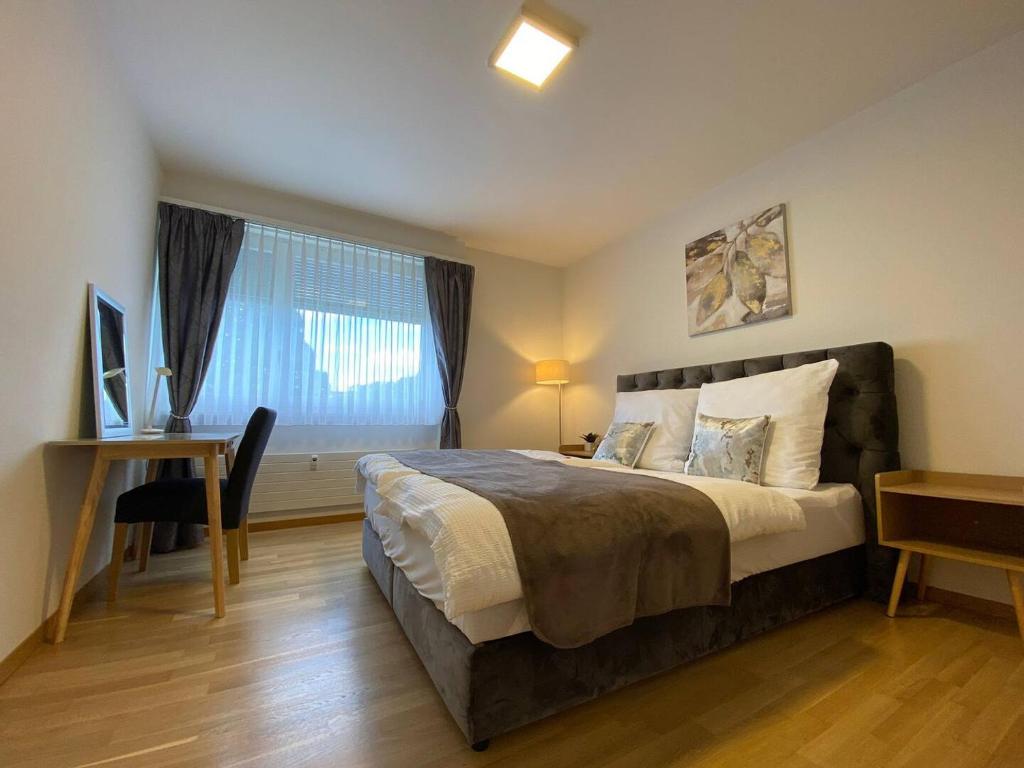 Postel nebo postele na pokoji v ubytování Apartment Arnold