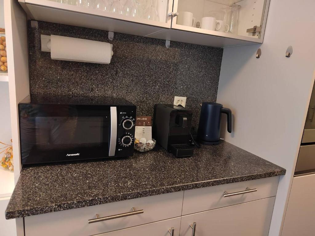 Kuchyň nebo kuchyňský kout v ubytování Apartment Arnold