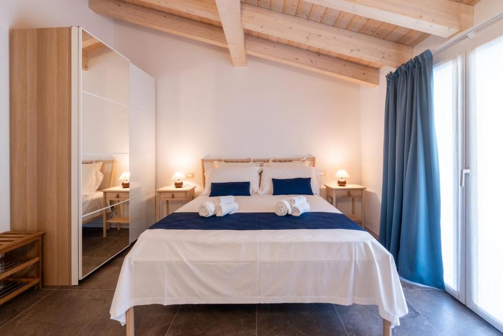 Postel nebo postele na pokoji v ubytování Relais Val del Tei