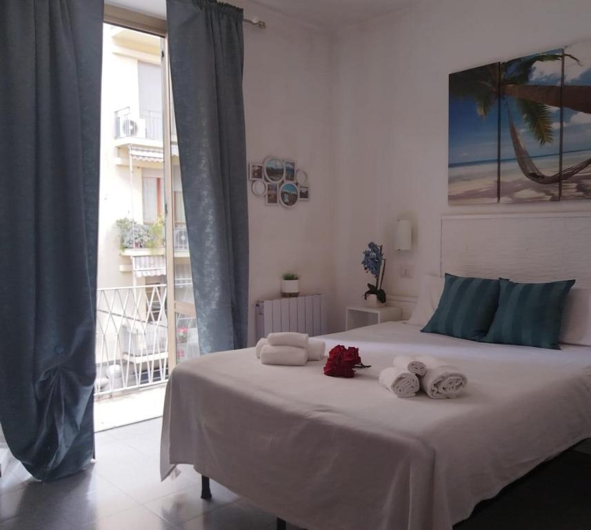Postel nebo postele na pokoji v ubytování Hotel Birillo