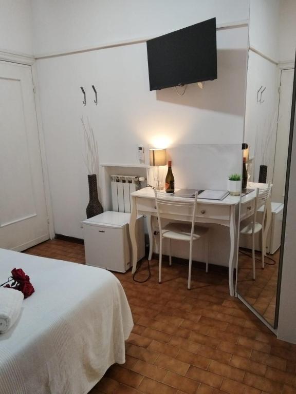 Postel nebo postele na pokoji v ubytování Hotel Birillo