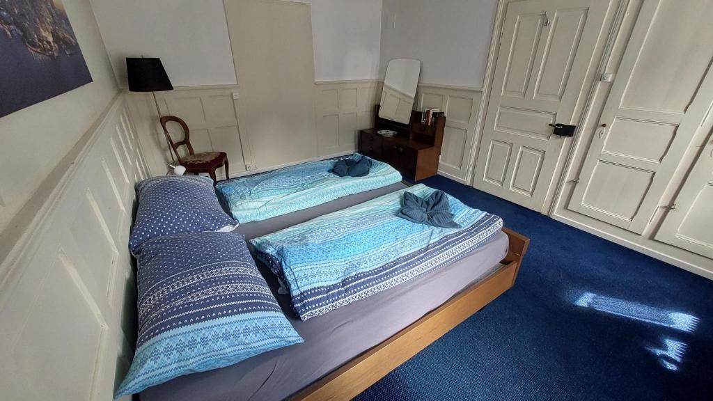 Postel nebo postele na pokoji v ubytování Ferienwohnung Rothorn Meiringen