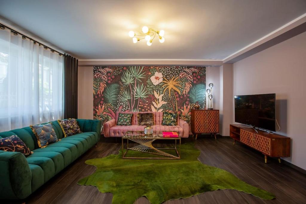 TV a/nebo společenská místnost v ubytování Deluxe-Apartment Frankfurt West