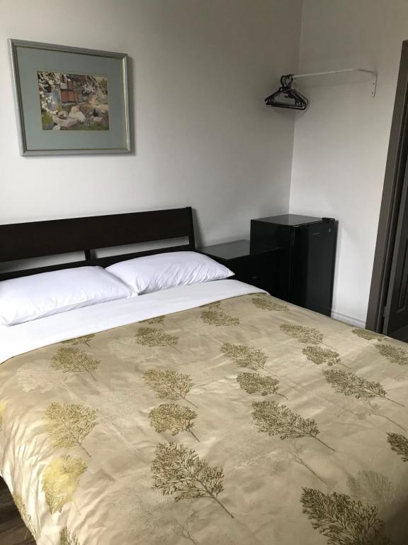 Postel nebo postele na pokoji v ubytování Hotel Bon Accueil