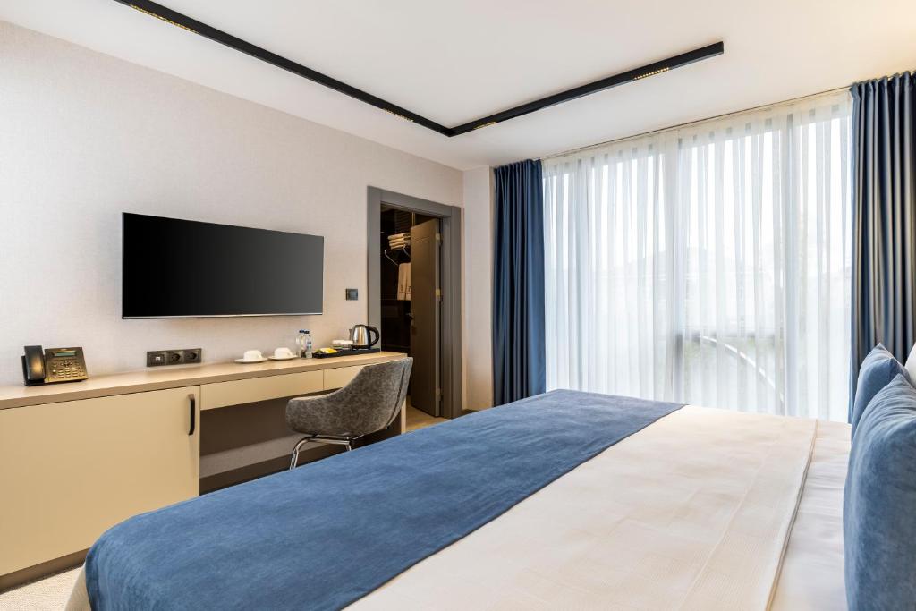 Rossi Luxury Hotel - Doppelzimmer Mit Gartenblick