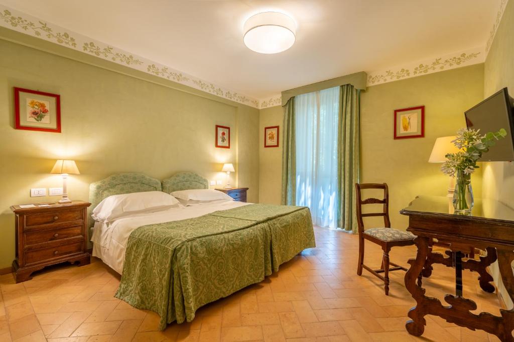 Postel nebo postele na pokoji v ubytování Park Hotel Villa Grazioli