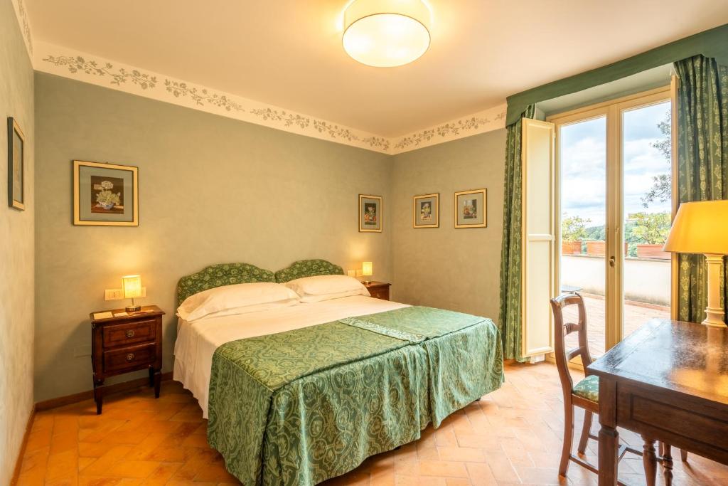 Postel nebo postele na pokoji v ubytování Park Hotel Villa Grazioli