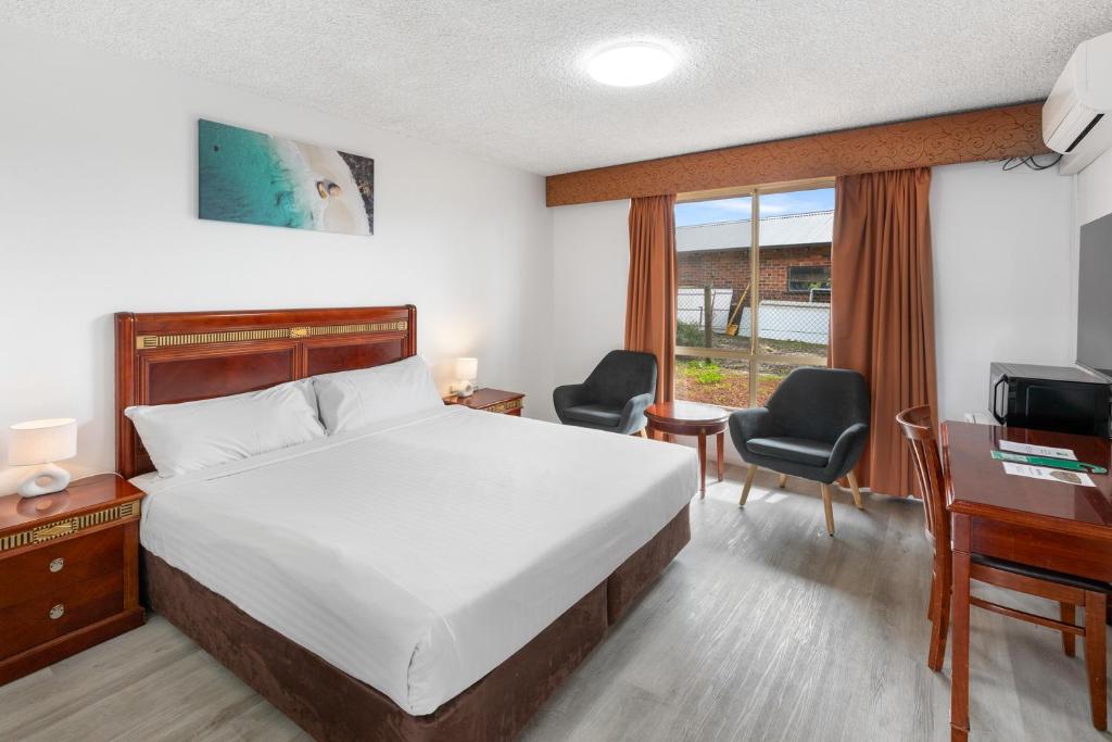 Ένα ή περισσότερα κρεβάτια σε δωμάτιο στο ibis Styles Albany