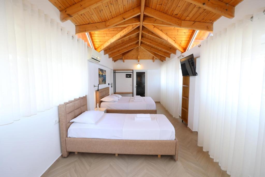 Postel nebo postele na pokoji v ubytování Hotel Golden Oak