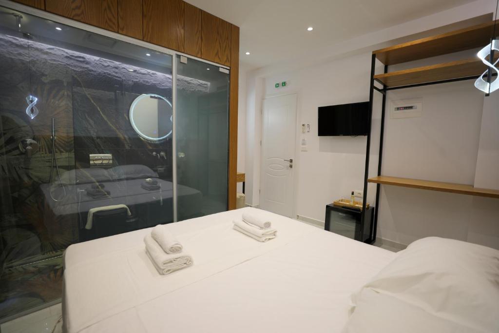 Postel nebo postele na pokoji v ubytování Hotel Golden Oak