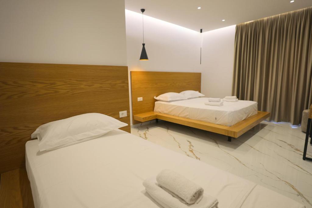 Postel nebo postele na pokoji v ubytování Hotel Golden Oak